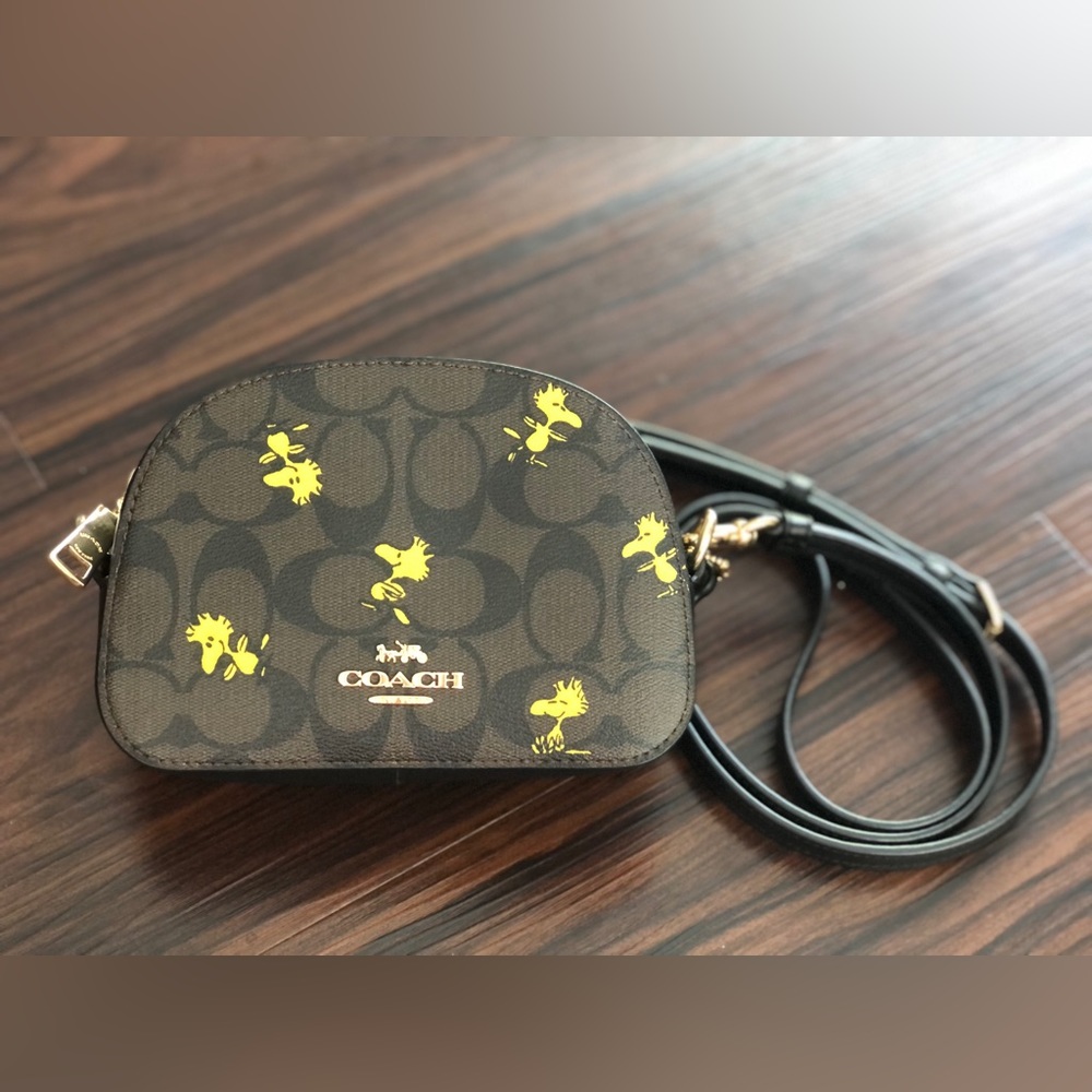Coach X Peanuts Mini Serena Brown Black Signature Canvas Woodstock Crossbody Bag
